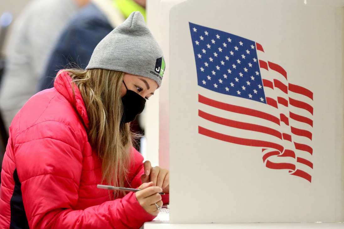 DES MOINES, IOWA - NOVEMBER 03: Voters mark their ballots at Bloomfield United Methodist Church on November 3, 2020 in Des Moines, Iowa. After a record-breaking early voting turnout, Americans head to the polls on Election Day to cast their vote for incumbent U.S. President Donald Trump or Democratic nominee Joe Biden in the 2020 presidential election.   Mario Tama/Getty Images/AFP