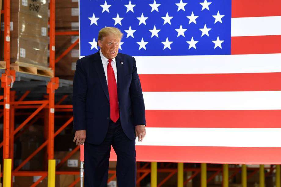 El presidente Donald Trump endurece las normas para migrar a Estados Unidos. / AFP
