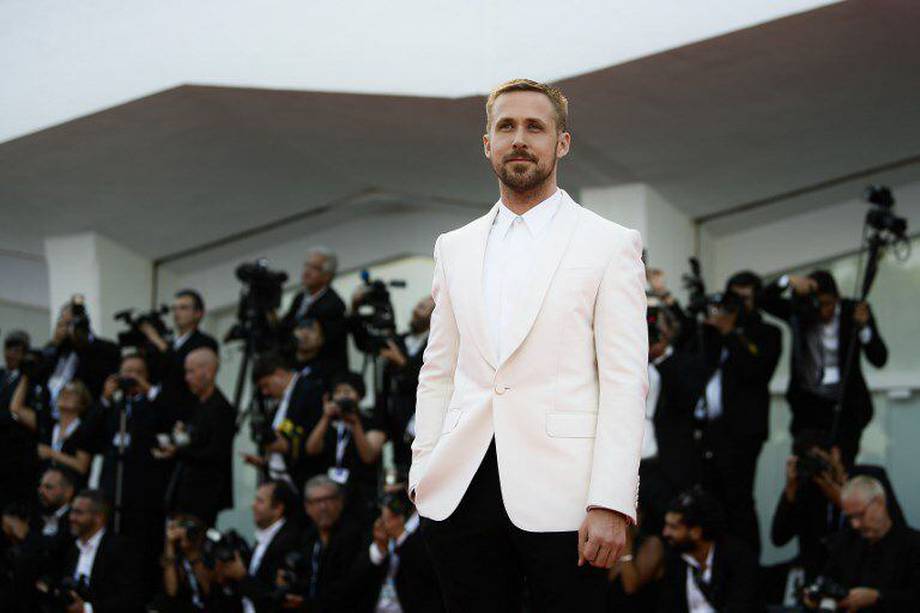 Actor Ryan Gosling arrives for the opening ceremony and the premiere of the film "First Man", presented in competition at the 75th Venice Film Festival on August 29, 2018 at Venice Lido. / AFP PHOTO / Filippo MONTEFORTE