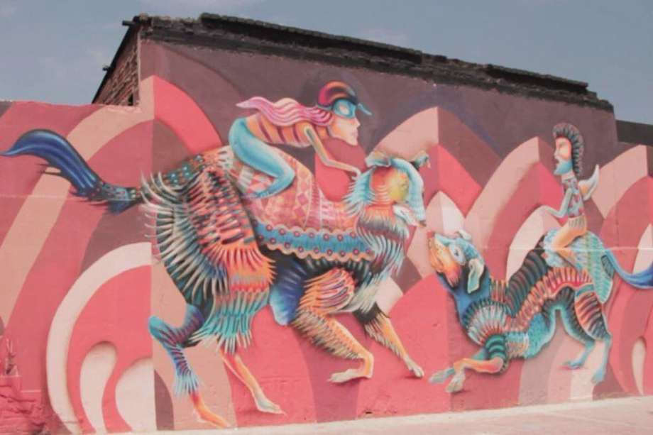 "Perros y Jinetes" fue la obra ganadora de la Beca Intervención Artística Urbana en la Carrera 10, impulsada por Idartes. Esta fue una de las invitaciones públicas en las que participó el muralista Égdar Tito Rodríguez Acevedo (Ródez).