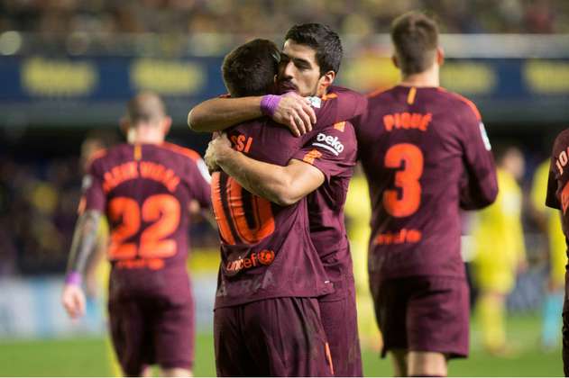 Suárez y Messi dan triunfo al Barcelona, que mantiene su ventaja en la Liga