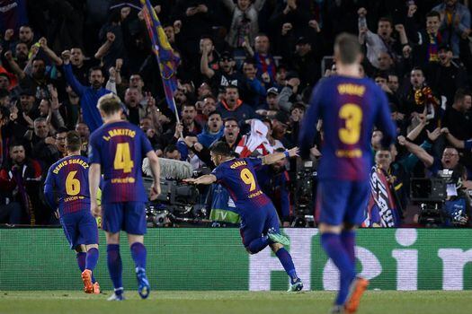 Luis Suárez celebra el cuarto gol del Barcelona frente a la Roma.  / AFP