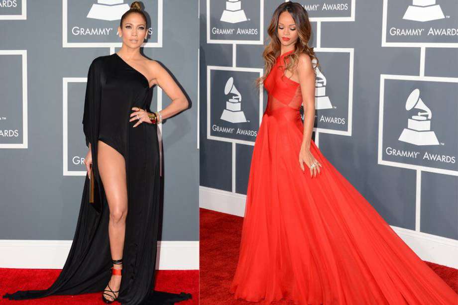Jennifer Lopez y Rihanna en la alfombra roja de los premios Grammy 2013. / AFP