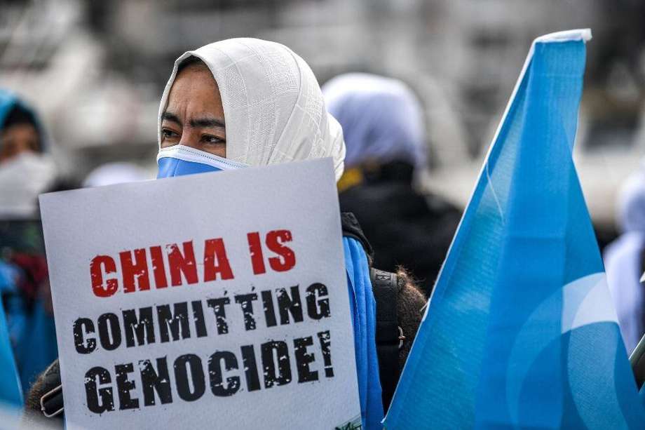 Miembros de la minoría de Mujeres Musulmanas Uigur se manifiestan para pedir noticias a sus familiares perseguidos en China.