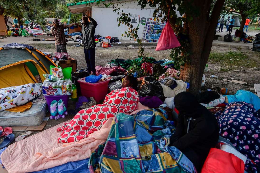 Haitian migrants are seen at a shelter in Ciudad Acuna, Coahuila state, Mexico, on September 23, 2021. - Tens of thousands of migrants, many of them Haitians previously living in South America, have arrived in recent weeks in Mexico hoping to enter the United States. (Photo by PEDRO PARDO / AFP)