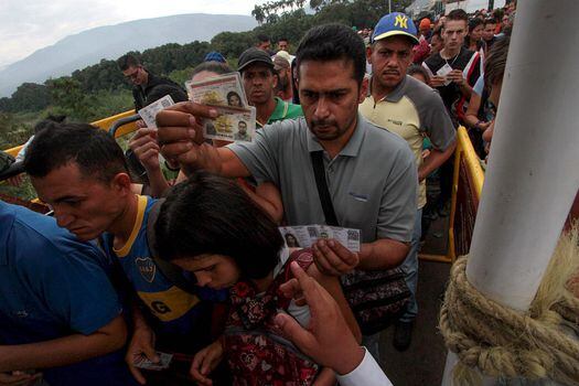 Desde el 6 de abril se abrió el proceso de registro de venezolanos en Colombia. / AFP