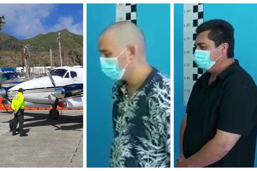 Juan Camilo Cadena (centro) y Harold Rivera (derecha), piloto y copiloto de la aeronave incautada con 446 kilos de cocaína.