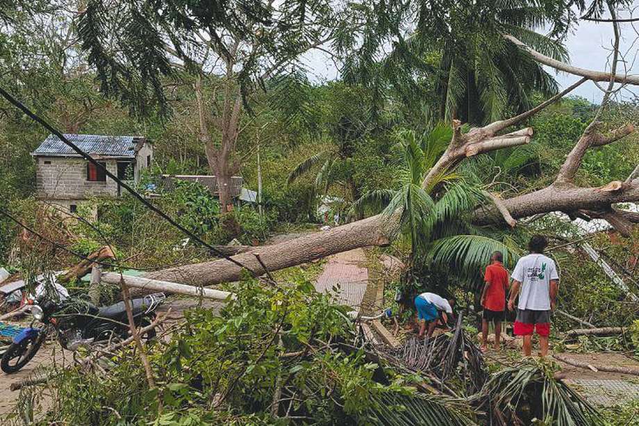 El paso del huracán Iota por San Andrés, Providencia y Santa Catalina dejó miles de personas damnificadas y sin techo. 
 / AFP / Liana FLOREZ
