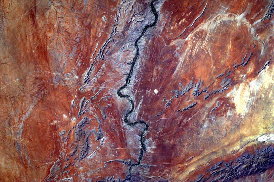 En la categoría de Tierra se destaca una imagen del sur del desierto de Kalahari, en África, tomada por un sistema de cámara en la Estación Espacial Internacional.