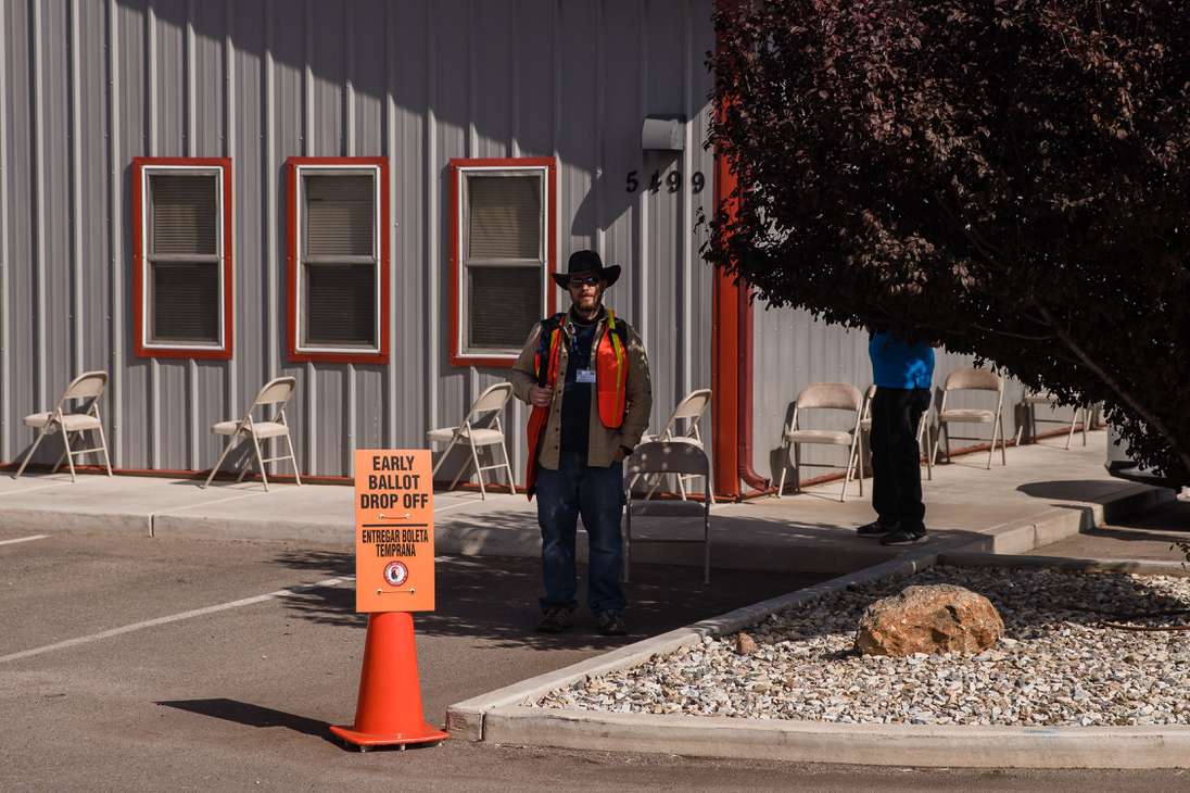 Mike Westman stands in front of Mountain Vista Baptist Church collecting ballots in Sierra Vista, Arizona on November 3, 2020. - The United States started voting Tuesday in an election amounting to a referendum on Donald Trump's uniquely brash and bruising presidency, which Democratic opponent and frontrunner Joe Biden urged Americans to end to restore "our democracy." (Photo by ARIANA DREHSLER / AFP)