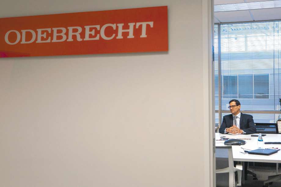 Signage is seen outside the office of Yuri Kertzman, president and chief executive officer of Odebrecht Construction Inc., right, during an interview in Miami, Florida, U.S, on Monday, Oct. 1, 2018. The U.S. Census Bureau is releasing construction spending figures on July 1. Photographer: Jayme Gershen/Bloomberg