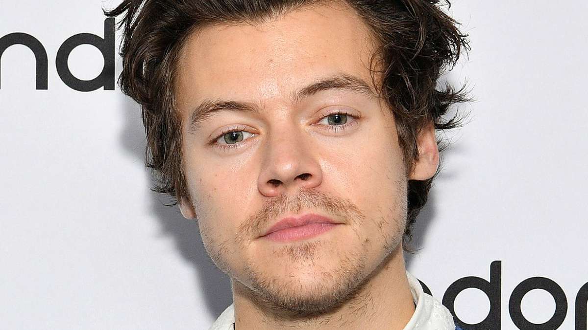 A Harry Styles fan is on trial for sending him 8,000 messages in one month