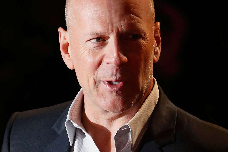 (FILES) In this file photo taken on February 07, 2013 US actor Bruce Willis poses for photographers while arriving for the UK premiere of 'A Good Day To Die Hard', the fifth film in the Die Hard franchise, in central London. - Willis has been diagnosed with dementia, his family said on February 16, 2023, less than a year after he retired from acting because of growing cognitive difficulties. (Photo by Justin TALLIS / AFP)