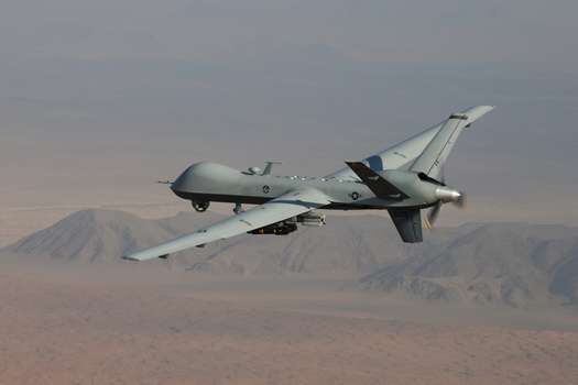 The MQ-9 Reaper drone, armed with laser-guided munitions and missiles, during a combat mission over southern Afghanistan. 