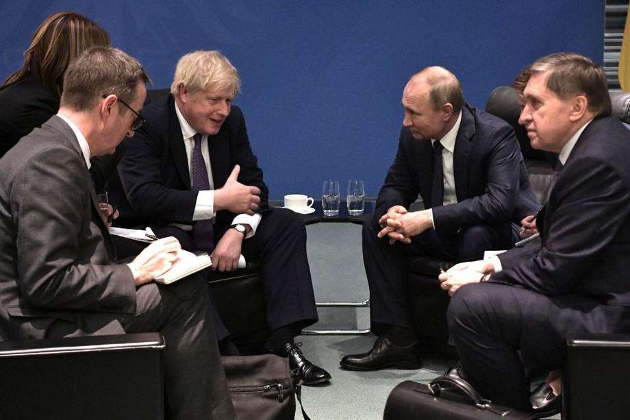 Boris Johnson, primer ministro británico, y Vladimir Putin, presidente de Rusia, se reunieron en enero de 2020, en la Conferencia sobre Libia.