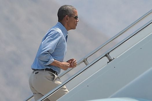 El presidente de Estados Unidos, Barack Obama, subiendo al Air Force One. / AFP