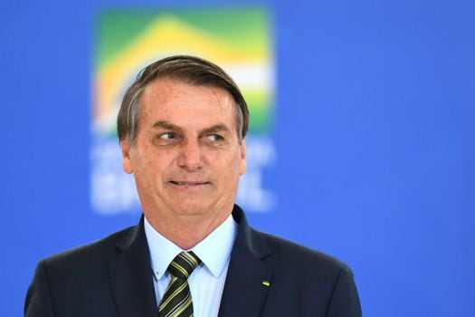 El mandatario ultraderechista de Brasil, Jair Bolsonaro, ha sido un crítico constante de los defensores del cambio climático, y ha defendido la expansión de actividades agropecuarias y mineras en la selva tropical. / AFP