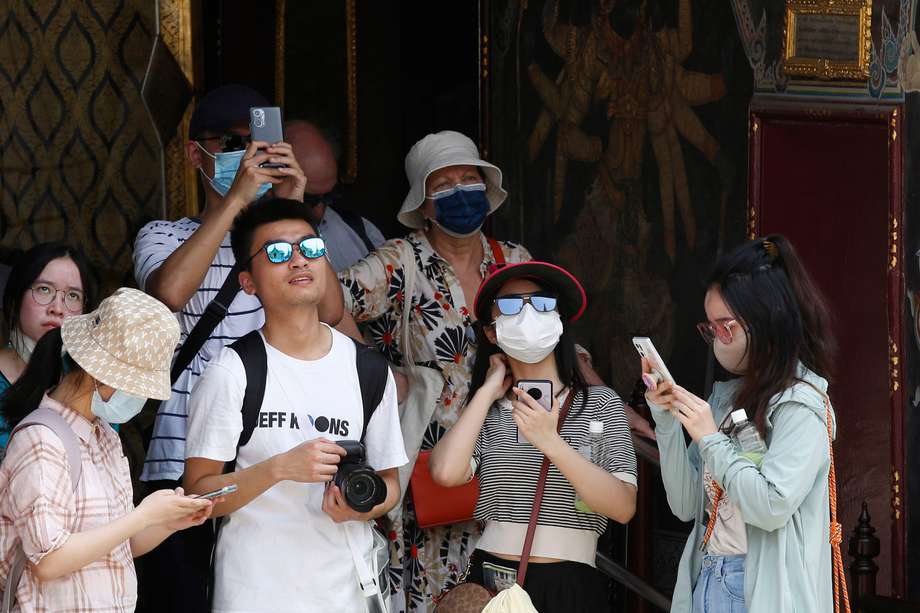 Turistas visitan China después del levantamiento de las medidas de covid cero. EFE/EPA/NARONG SANGNAK
