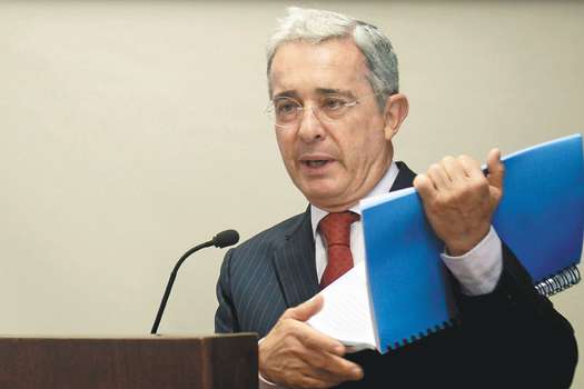 Colombian former President and Senator Alvaro Uribe, speaks during the Forum "Reflections on Havana agreements and plebiscite"  in Caldas,  Antioquia department, Colombia on August 29, 2016.  Colombia began its first day of peace with the country's largest insurgency after a ceasefire went into effect, ending 52 years of warfare. The full ceasefire ordered by President Juan Manuel Santos and the head of the Revolutionary Armed Forces of Colombia (FARC), Timoleon Jimenez, began at midnight Sunday (0500 GMT Monday). / AFP / RAUL ARBOLEDA