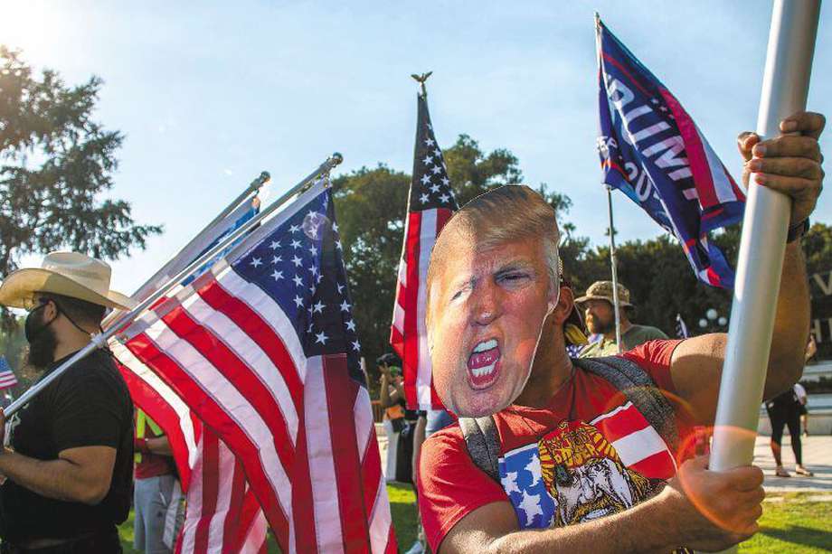Simpatizantes apoyando al presidente Donald Trump / AFP / Apu GOMES
