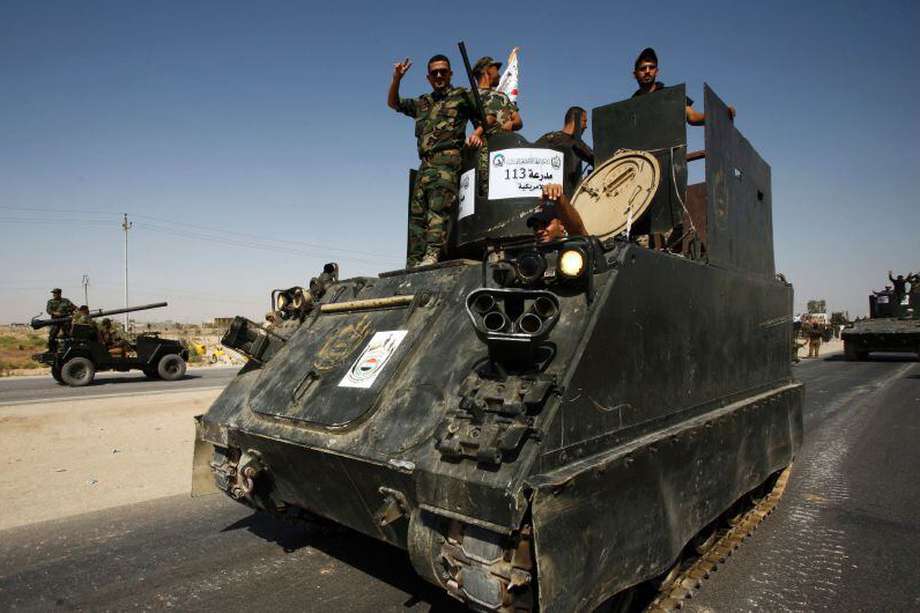 Miembros de la Unidad de Movilización Popular que apoyan a las tropas iraquíes a retomar Mosul.  /AFP