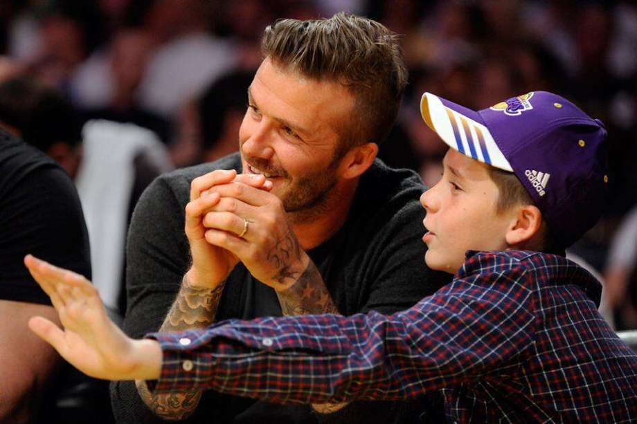 David Beckham y su hijo Brooklyn. / Efe