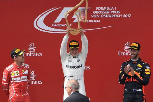 Sebastian Vettel, Valtteri Bottas y Daniel Ricciardo en el podio del Gran Premio de Austria.  / AFP