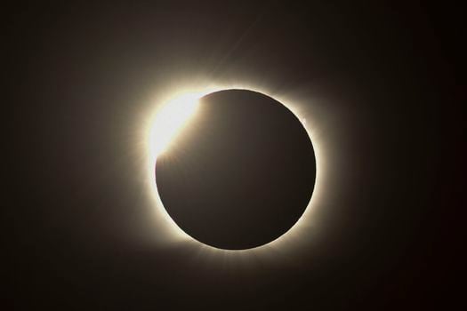 The diamond ring effect is seen during the total solar eclipse from Piedra del Aquila, Neuquen province, Argentina on December 14, 2020. (Photo by RONALDO SCHEMIDT / AFP)