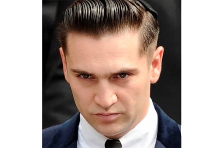 Reg Traviss, el novio de Amy Winehouse, asiste al funeral de la cantante el 26 de julio de 2011. / AFP