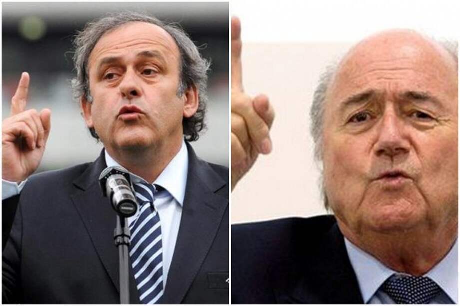 Michel Platini, presidente de la UEFA (i), Joseph Blatter (d)