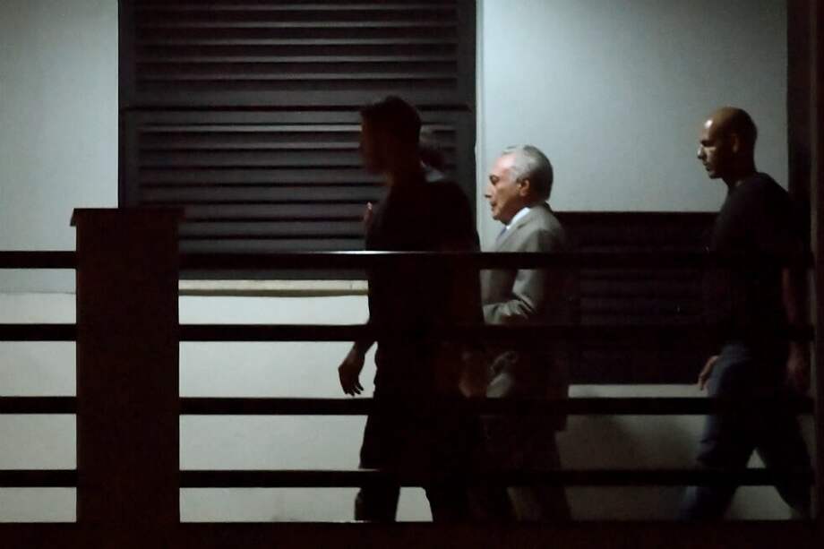 El expresidente Michel Temer quien sucedió a Dilma Rousseff ya tiene cuatro denuncias en su contra por lavado de activos y corrupción. / AFP