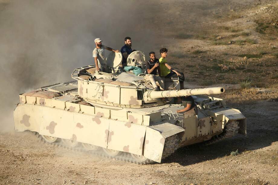 La violencia aumentó esta semana, en un momento en que las fuerzas gubernamentales sirias se plantean recuperar el sur militarmente. / AFP