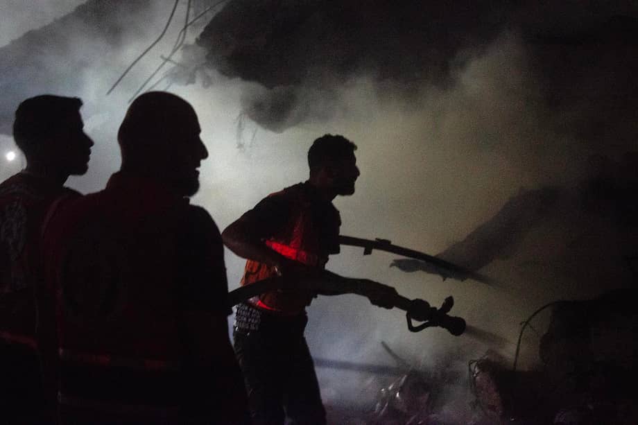GAZA CITY (---), 23/07/2026.- Palestinian firefighters attempt to extinguish a fire at a house destroyed in an Israeli airstrike in the Gaza Strip, 23 July 2026. The Palestinian Ministry of Health said at least three people were killed in Israeli attacks across the territory on 23 July. EFE/EPA/MOHAMMED SABER