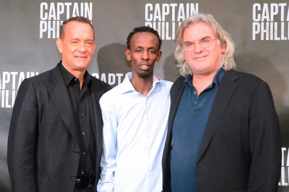 Los actores Tom Hanks y Barkhad Abdi posan junto al director Paul Greengrass.