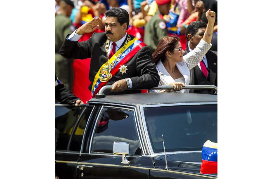 El presidente Nicolás Maduro acompañado de su esposa, Cilia Flores. / EFE