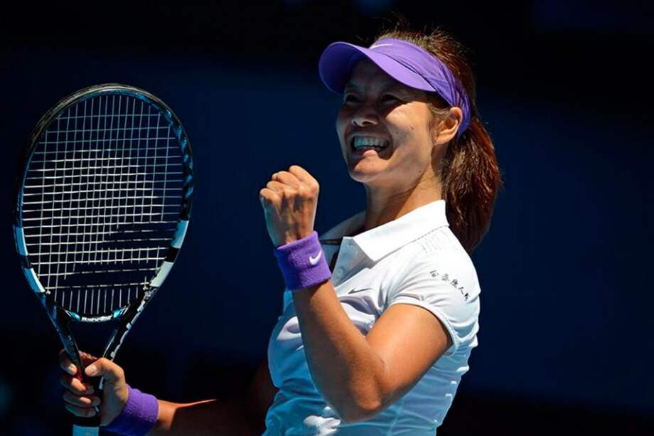 La china Li Na celebra tras vencer a la polaca Agnieszka Radwanska.