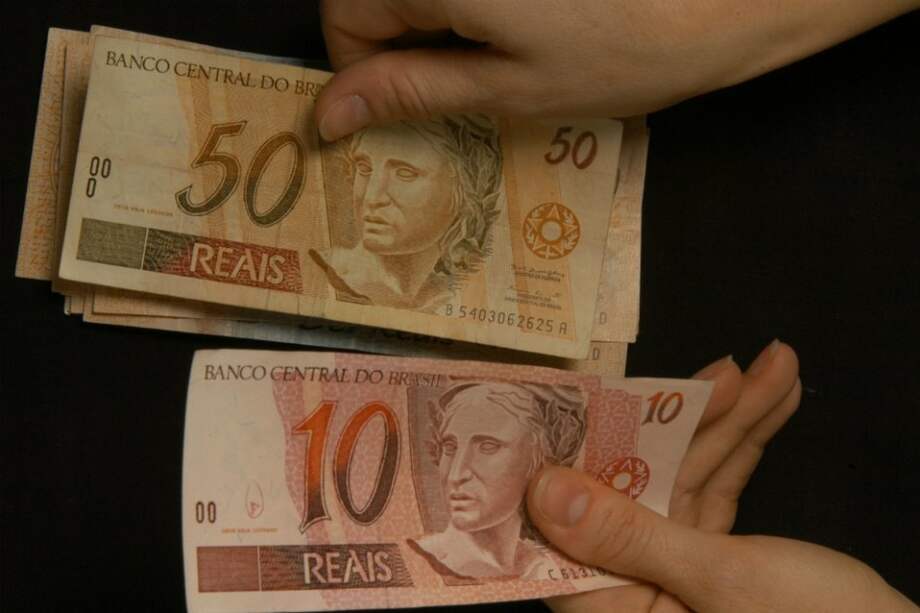 Crece el número de créditos en mora en una economía en dificultades. / Bloomberg News