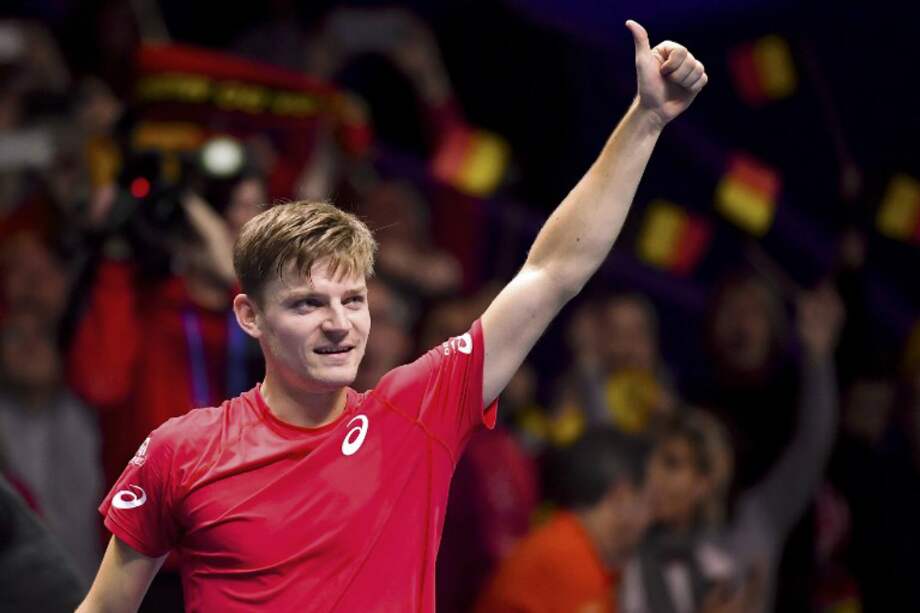 El belga David Goffin celebra tras obtener para Bélgica el primer punto en la final de la Copa Davis. / AFP