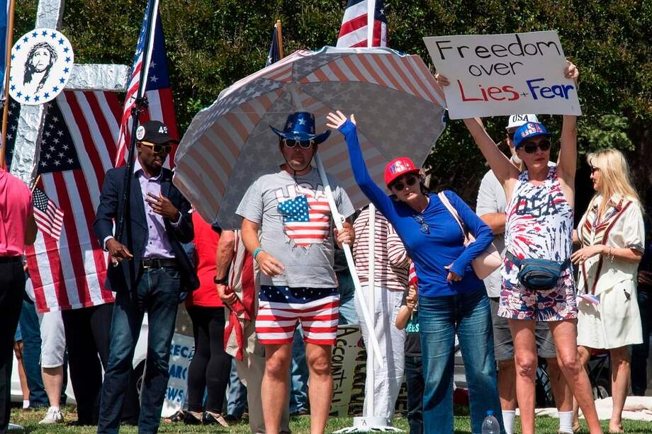 Manifestaciones contra el confinamiento en Estados Unidos. / AFP