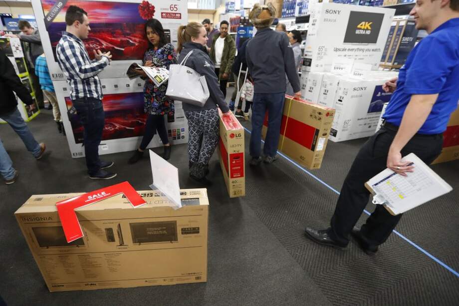 El "Black Friday" ya empezó en varios centros comerciales de EE. UU. En Colombia se vivirá en 24 ciudades. / AFP