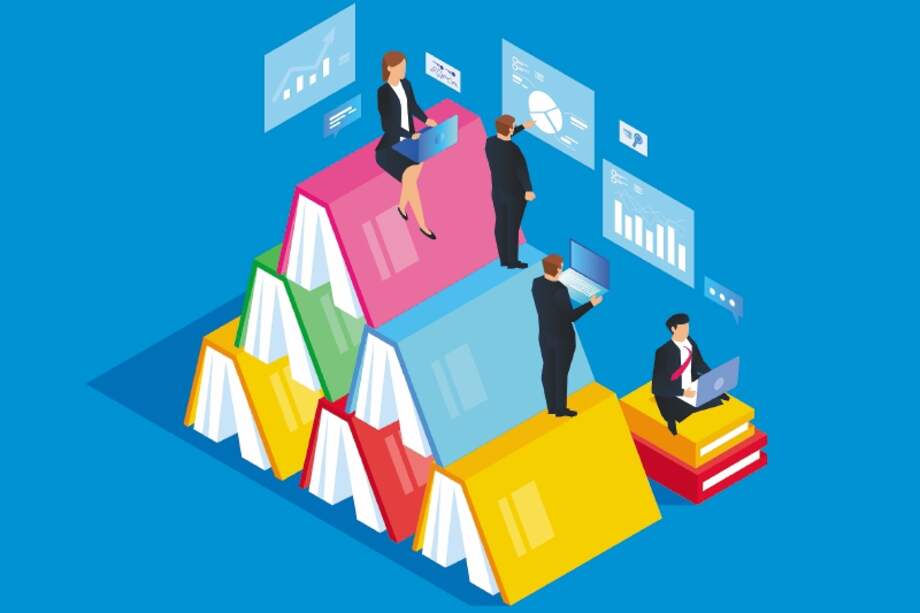 Team working on stacked books, business ideas and business knowledge for businessman success