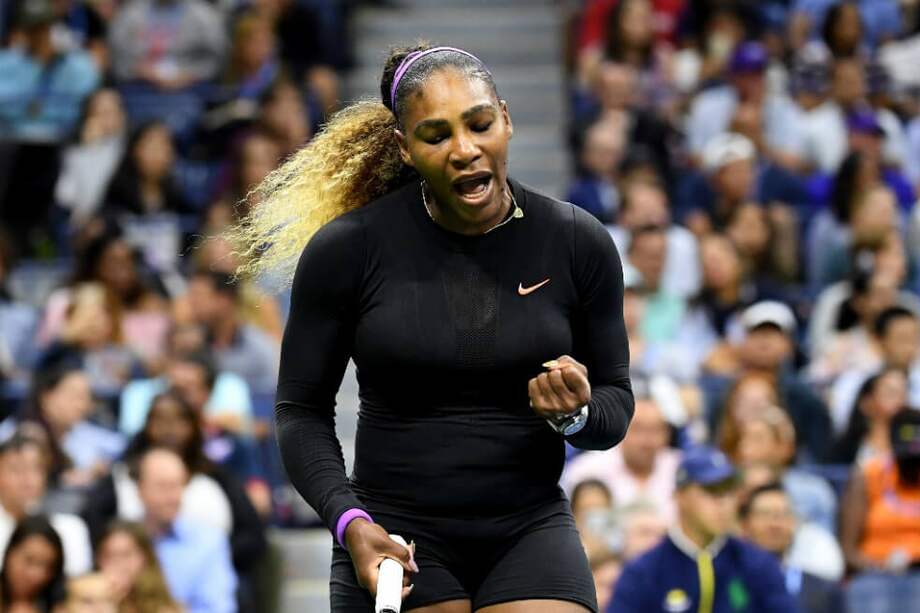 Williams celebra un punto ganado durante el partido ante Sharapova. / AFP