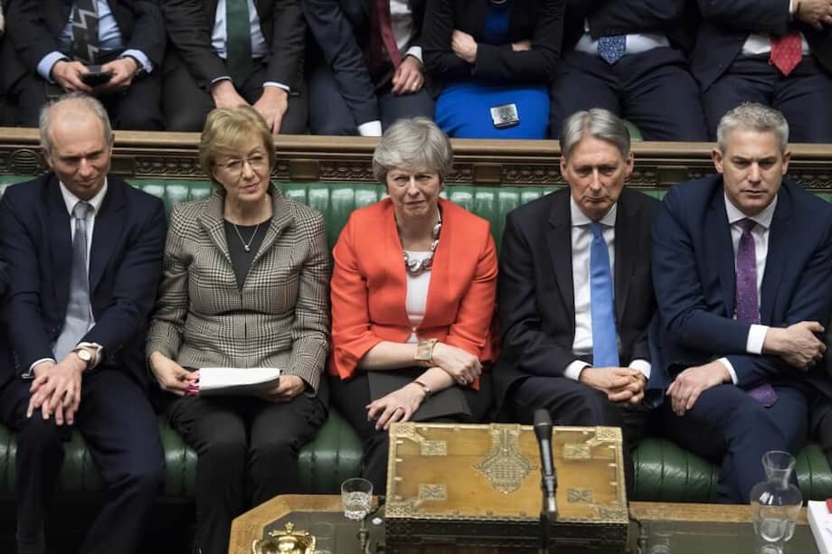 Theresa May durante la votación de hoy en el Parlamento británico. / AFP