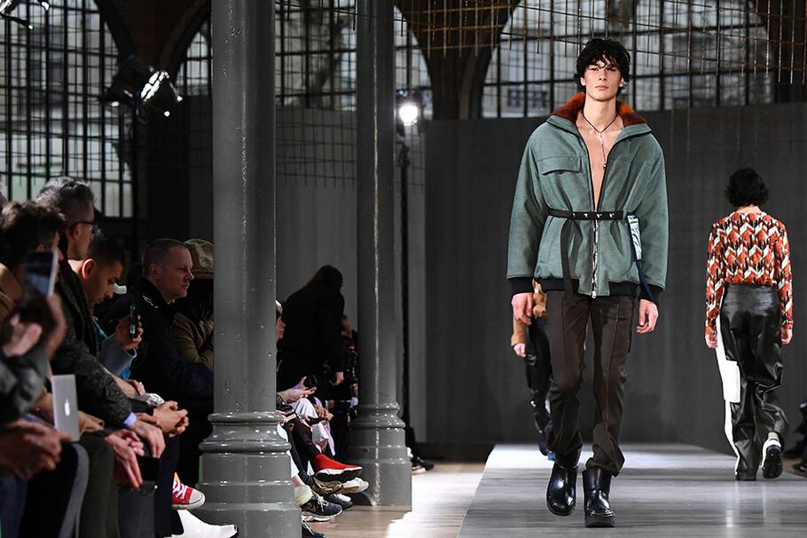 A model presents a creation by Acne Studios during the men's Fall/Winter 2019/2020 collection fashion show in Paris on January 16, 2019. (Photo by Anne-Christine POUJOULAT / AFP)
