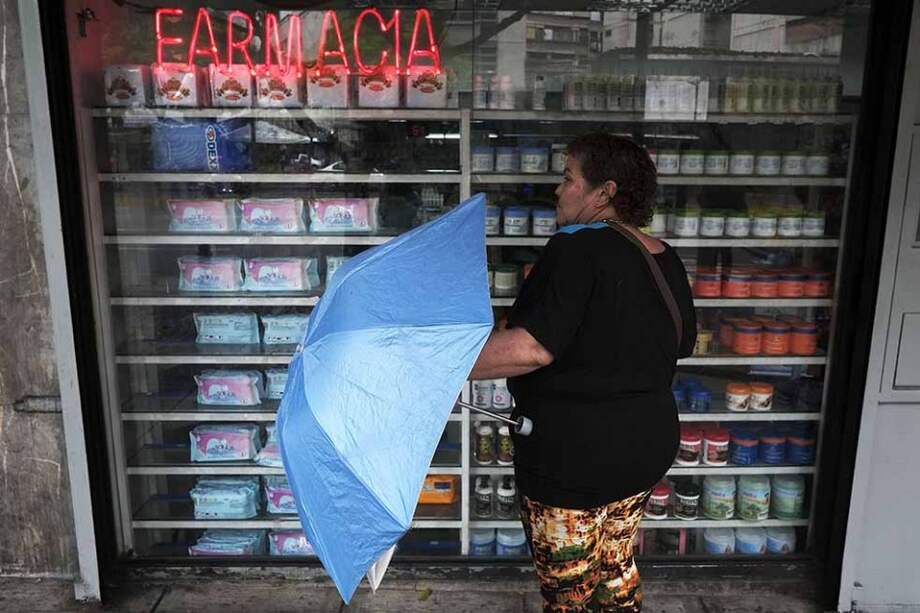 La escasez es una de las principales razones que hacen de estas las elecciones más difíciles para el Gobierno. / AFP