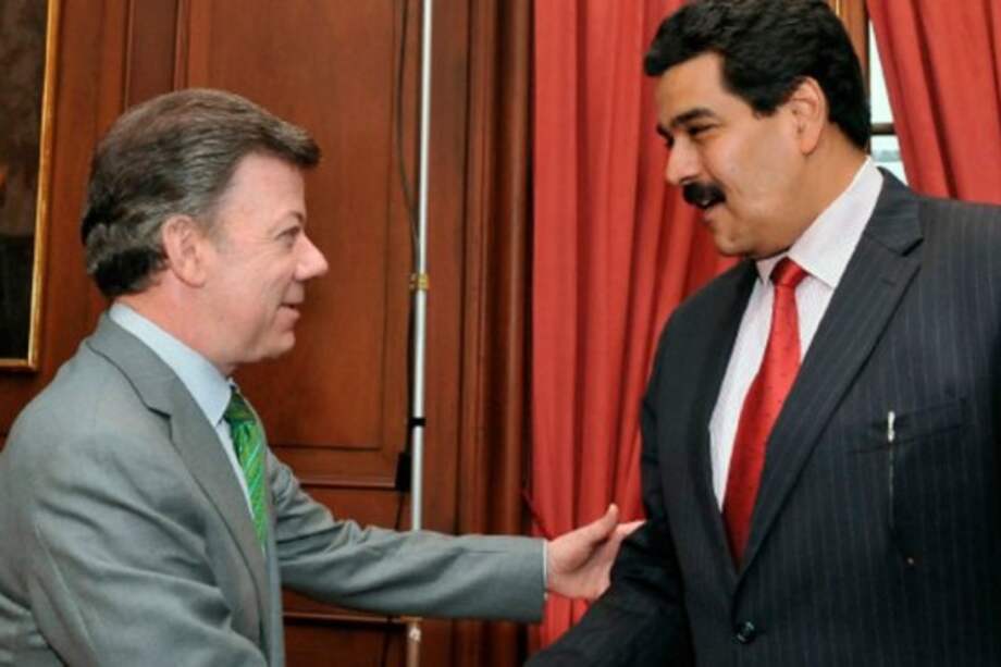 Presidente Juan Manuel Santos con su homólogo de Venezuela, Nicolás Maduro.