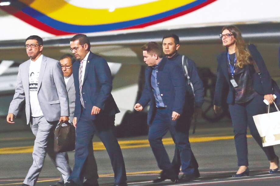 Ricardo Rivas (izq.) estará en Bogotá en compañía de los familiares de los otros dos integrantes del diario “El Comercio". / AP