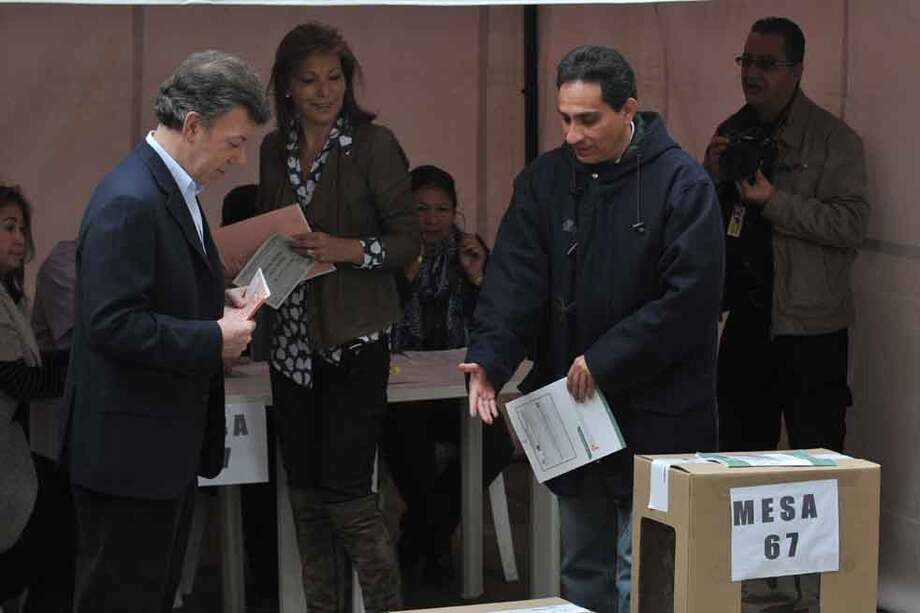 El presidente Juan Manuel Santos anunció su intención de aspirar a la reelección. En mayo tendrá que competir por el voto popular en las urnas, donde espera ganar las elecciones en primera vuelta. /Gabriel Aponte