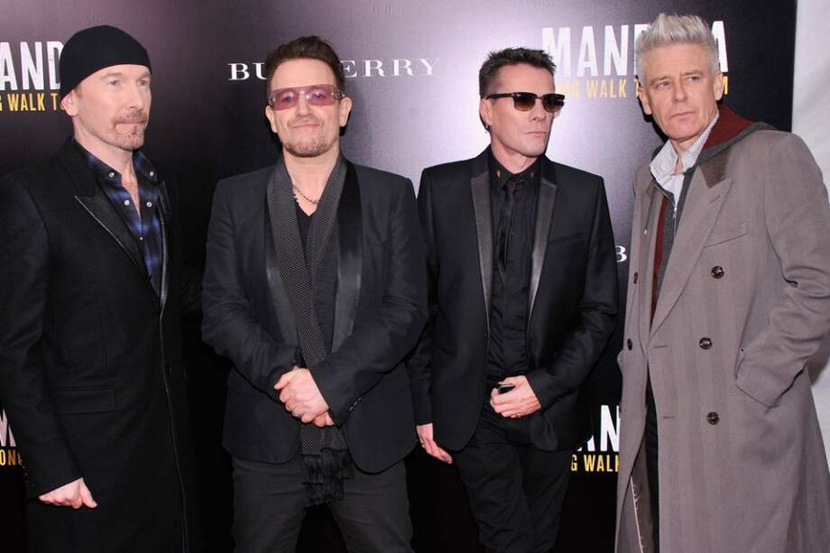 U2 en el estreno de la película "Mandela: Long Walk to Freedom".