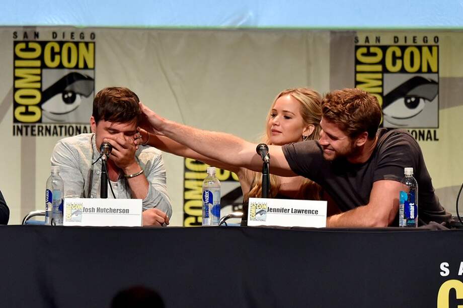 Los actores Josh Hutcherson, Jennifer Lawrence y Liam Hemsworth. / AFP